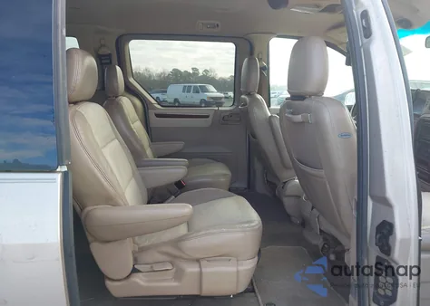 2001 Ford Windstar Limited z USA, uszkodzony, nr VIN 2FMDA584X1BB06423